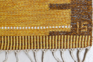 A Vintage Swedish kilim Rug by Ingegerd Silow. An original röllakan flatweave carpet featuring a yellow field and unique geometric design. 
