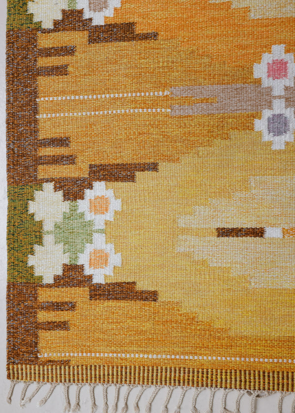 A Vintage Swedish kilim Rug by Ingegerd Silow. An original röllakan flatweave carpet featuring a yellow field and unique geometric design. 