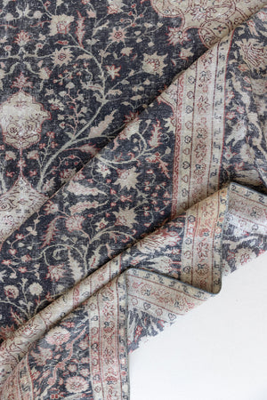 This is an large antique Persian Mahal handwoven carpet in a deep navy blue and a pinky red with ivory tones. This vintage hand woven wool rug features a all over floral design.