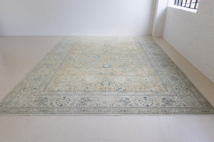 A handwoven Persian Mahal carpet. This antique rug features a calming blue colour palette and a stunning all over shah abassi design.