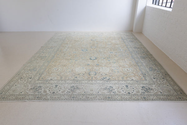 A handwoven Persian Mahal carpet. This antique rug features a calming blue colour palette and a stunning all over shah abassi design.