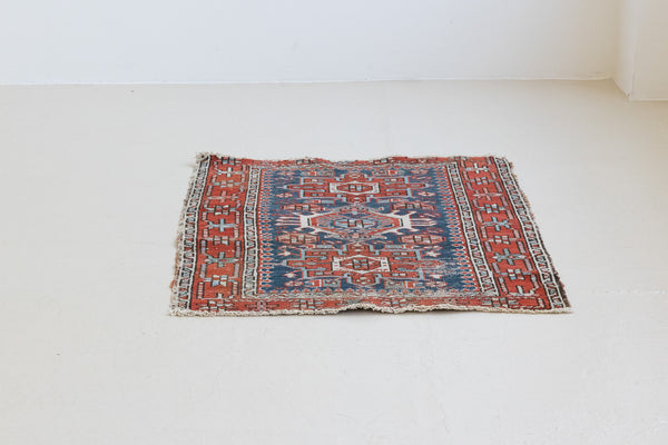 Shirin is a small, bold Heriz rug. The Heriz is one of the most sought after and recognisable Persian designs, known for vibrant colours and bold geometric patterns. These rugs are real investment pieces and look stunning in modern homes.