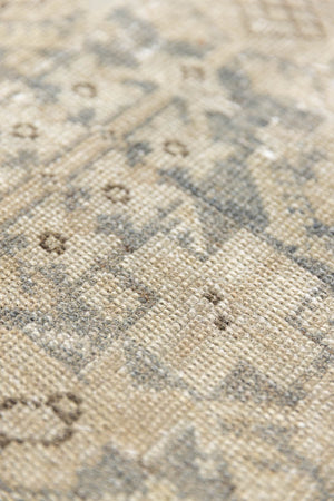 Detail of a genuine antique Persian Malayer runner in blue tones, a handmade carpet with an all-over design.