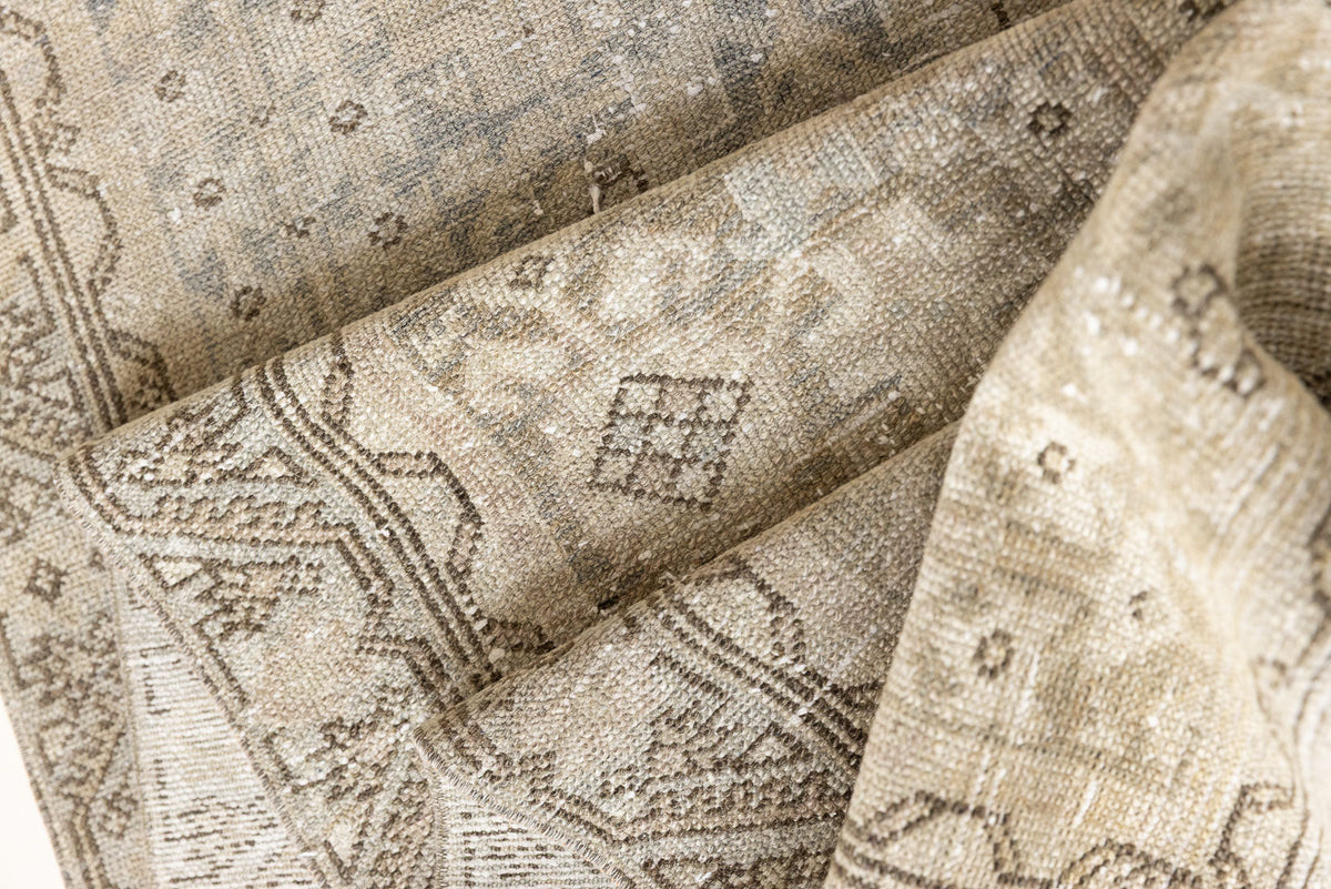 This is an antique Persian Malayer runner, a handmade rug in blue tones, featuring an all-over design.