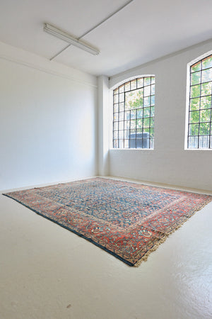 Farahan rugs are known for their high quality and are some of the most valuable Persian styles known for their repeating all over designs. Adeline is a large rug featuring a beautiful, intricate all over design on a dark blue ground with red boarder.