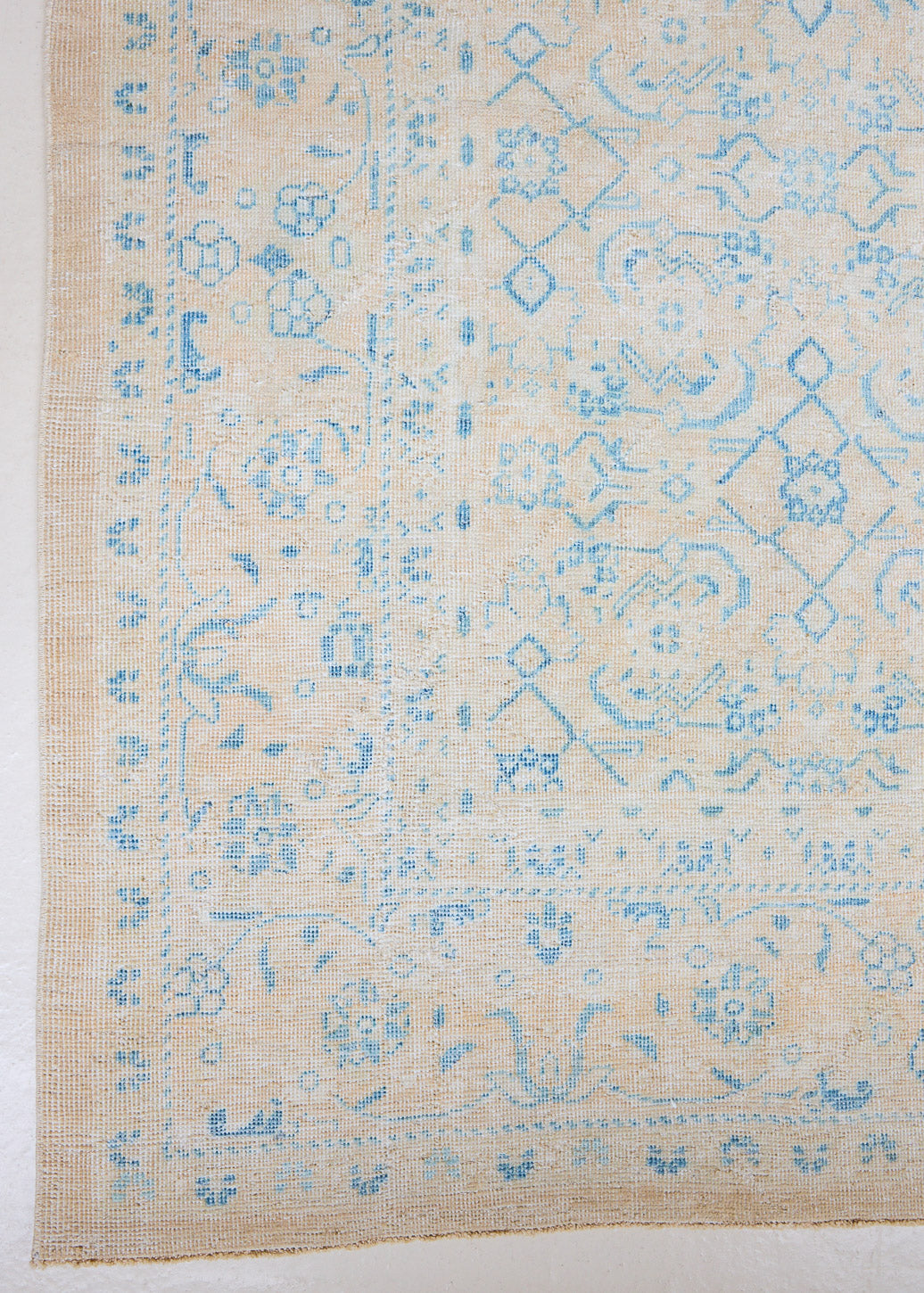 Annabelle is a beautiful Mahal rug featuring a peachy taupe field and a pretty, decorative all over floral design in blue