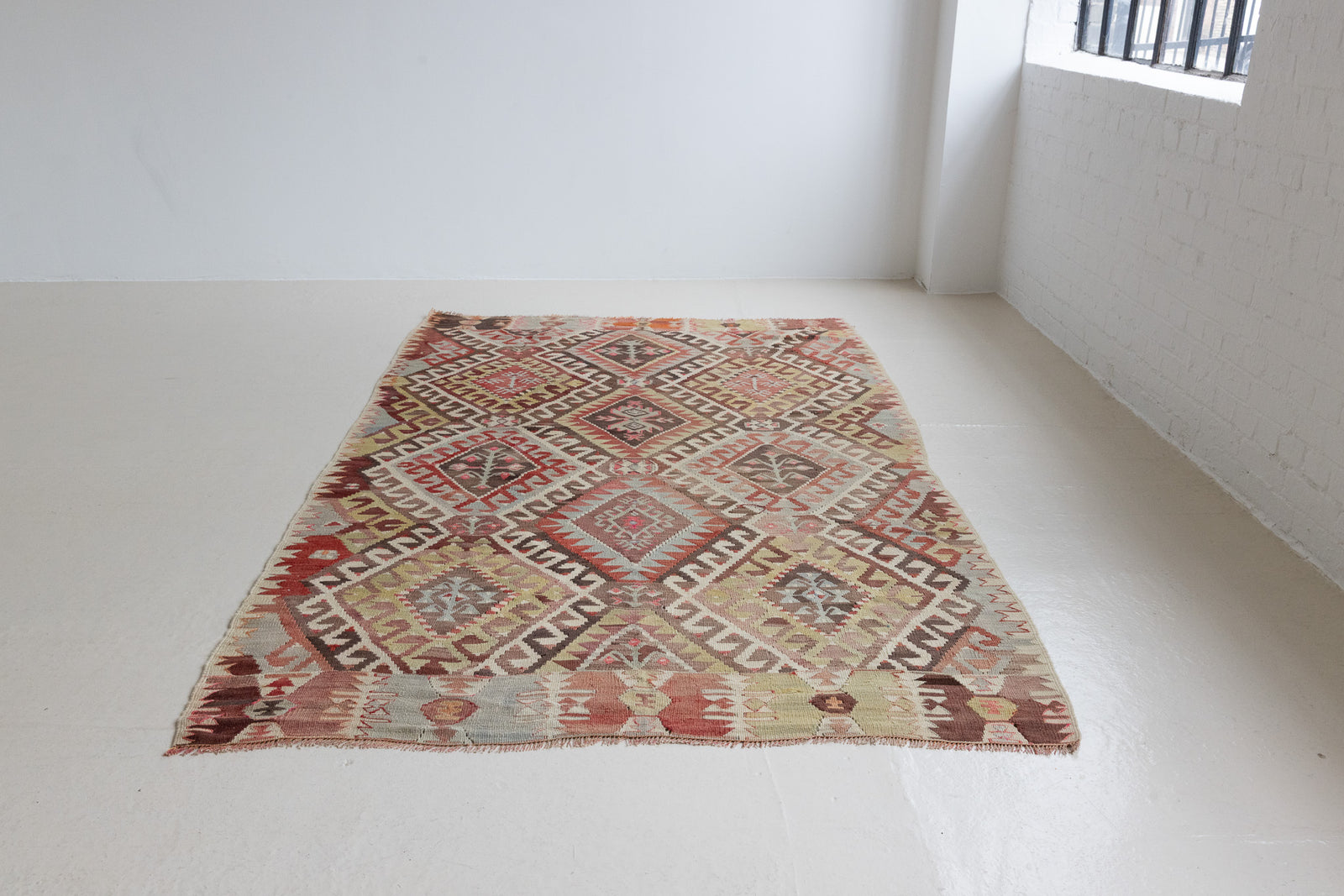 Isadora is a bold, geometric flatweave antique Anatolian kilim.