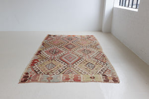 Isadora is a bold, geometric flatweave antique Anatolian kilim.