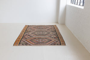 Arinna is a brightly coloured East Anatolian kilim. Hand-woven on village and nomadic looms in vivid, naturally dyed colours, a tradition stretching back thousands of years. Kilims were woven for the practicalities of daily life and used as floor and wall coverings, storage bags, and prayer mats. Arinna features the classic dragon motif, long believed to guard treasures and secret objects such as the tree of life.&nbsp;