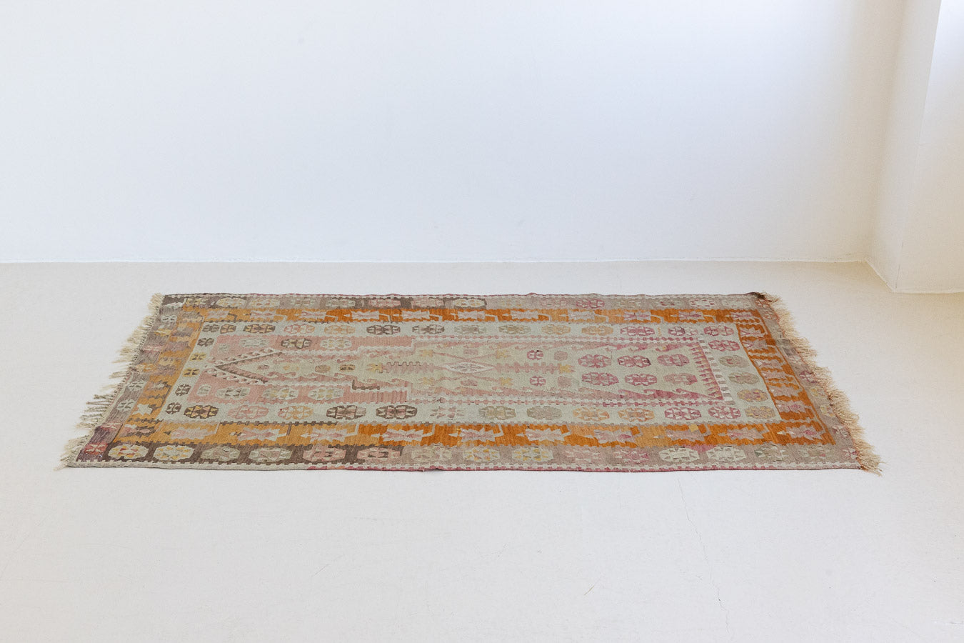 Mirelli is a Central Anatolian kilim. Hand-woven on village and nomadic looms in vivid, naturally dyed colours. Mirelli is dotted with the classic Anatolian star motif, long believed to symbolise happiness and fertility.