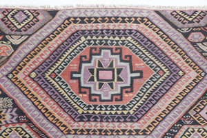 Arinna is a brightly coloured East Anatolian kilim. Hand-woven on village and nomadic looms in vivid, naturally dyed colours, a tradition stretching back thousands of years. Kilims were woven for the practicalities of daily life and used as floor and wall coverings, storage bags, and prayer mats. Arinna features the classic dragon motif, long believed to guard treasures and secret objects such as the tree of life.