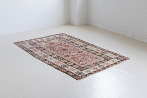 Solenne is a Central Anatolian Gömürgen Kilim rug. These kilims are hand-woven from locally sourced naturally dyed wool, a tradition stretching back thousands of years. Gömürgen kilims are known for their distinctive coal-black tones. Solenne features the classic star, eye, and comb motifs - long believed to bring happiness, ward off harm, and symbolise marriage and fertility.
