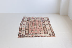 Solenne is a Central Anatolian Gömürgen Kilim rug. These kilims are hand-woven from locally sourced naturally dyed wool, a tradition stretching back thousands of years. Gömürgen kilims are known for their distinctive coal-black tones. Solenne features the classic star, eye, and comb motifs - long believed to bring happiness, ward off harm, and symbolise marriage and fertility.