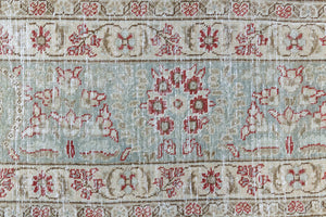 This is a handmade vintage Tabriz rug woven in Persia. The Tabriz region is known for producing some of the most ornate Persian carpet, often known for their mesmerising and intricate repeating patterns.
