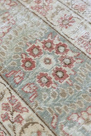 This is a handmade vintage Tabriz rug woven in Persia. The Tabriz region is known for producing some of the most ornate Persian carpet, often known for their mesmerising and intricate repeating patterns.