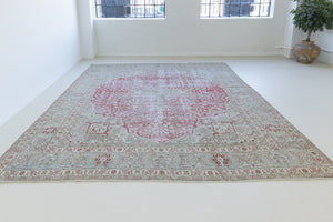 This is a handmade vintage Tabriz rug woven in Persia. The Tabriz region is known for producing some of the most ornate Persian carpet, often known for their mesmerising and intricate repeating patterns.