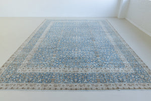 Tess is an original oversized Persian Kerman rugs from the the south east of Kerman, carpets from this part of Persia often feature very intricate floral designs. This is a lovely rug with muted tones.