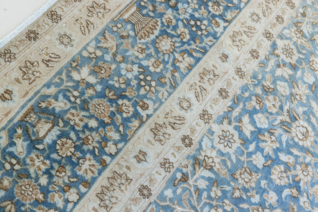 Tess is an original oversized Persian Kerman rugs from the the south east of Kerman, carpets from this part of Persia often feature very intricate floral designs. This is a lovely rug with muted tones.