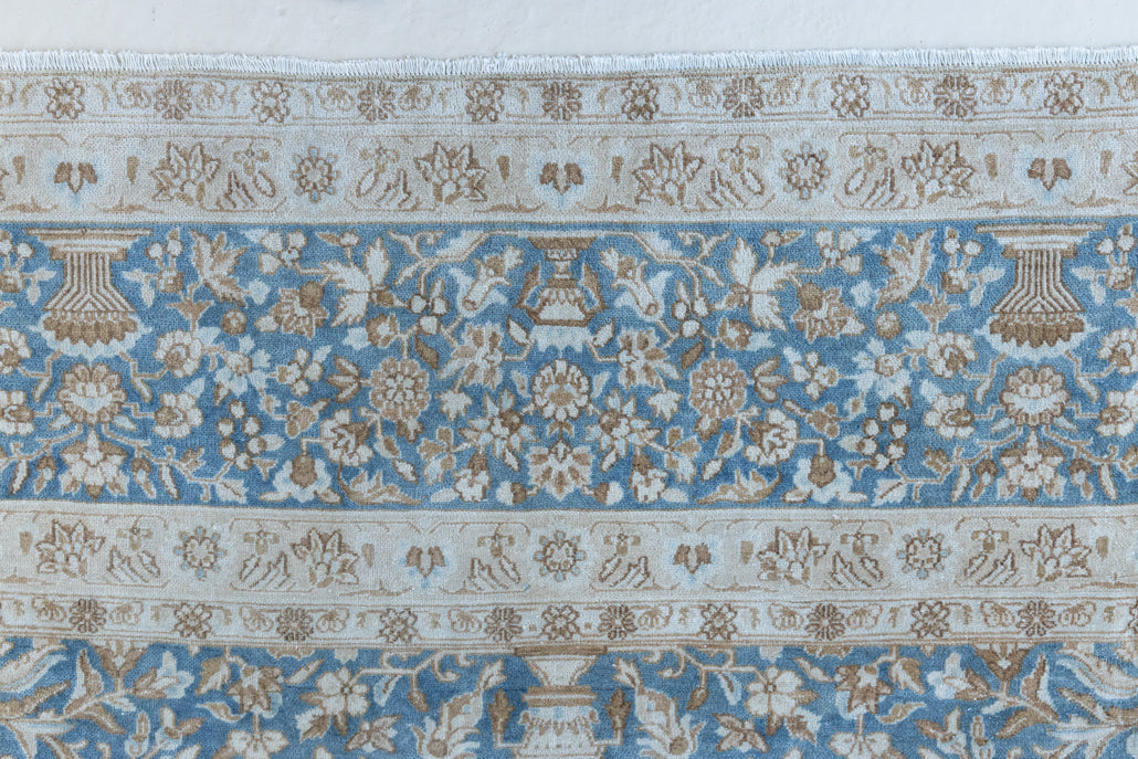Tess is an original oversized Persian Kerman rugs from the the south east of Kerman, carpets from this part of Persia often feature very intricate floral designs. This is a lovely rug with muted tones.