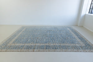 Tess is an original oversized Persian Kerman rugs from the the south east of Kerman, carpets from this part of Persia often feature very intricate floral designs. This is a lovely rug with muted tones.