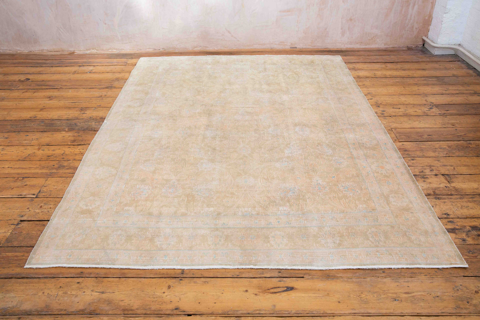 This is a vintage Persian Mahal rug that has been over-dyed to gently fade its original colours, giving a more neutral palette. Persia has the most desirable rugs and carpets with stunning designs such as this carpet. Now available at Ourika London.