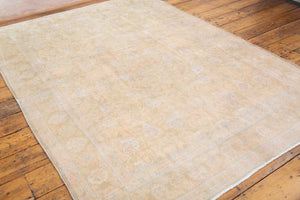 This is a vintage Persian Mahal rug that has been over-dyed to gently fade its original colours, giving a more neutral palette. Persia has the most desirable rugs and carpets with stunning designs such as this carpet. Now available at Ourika London.