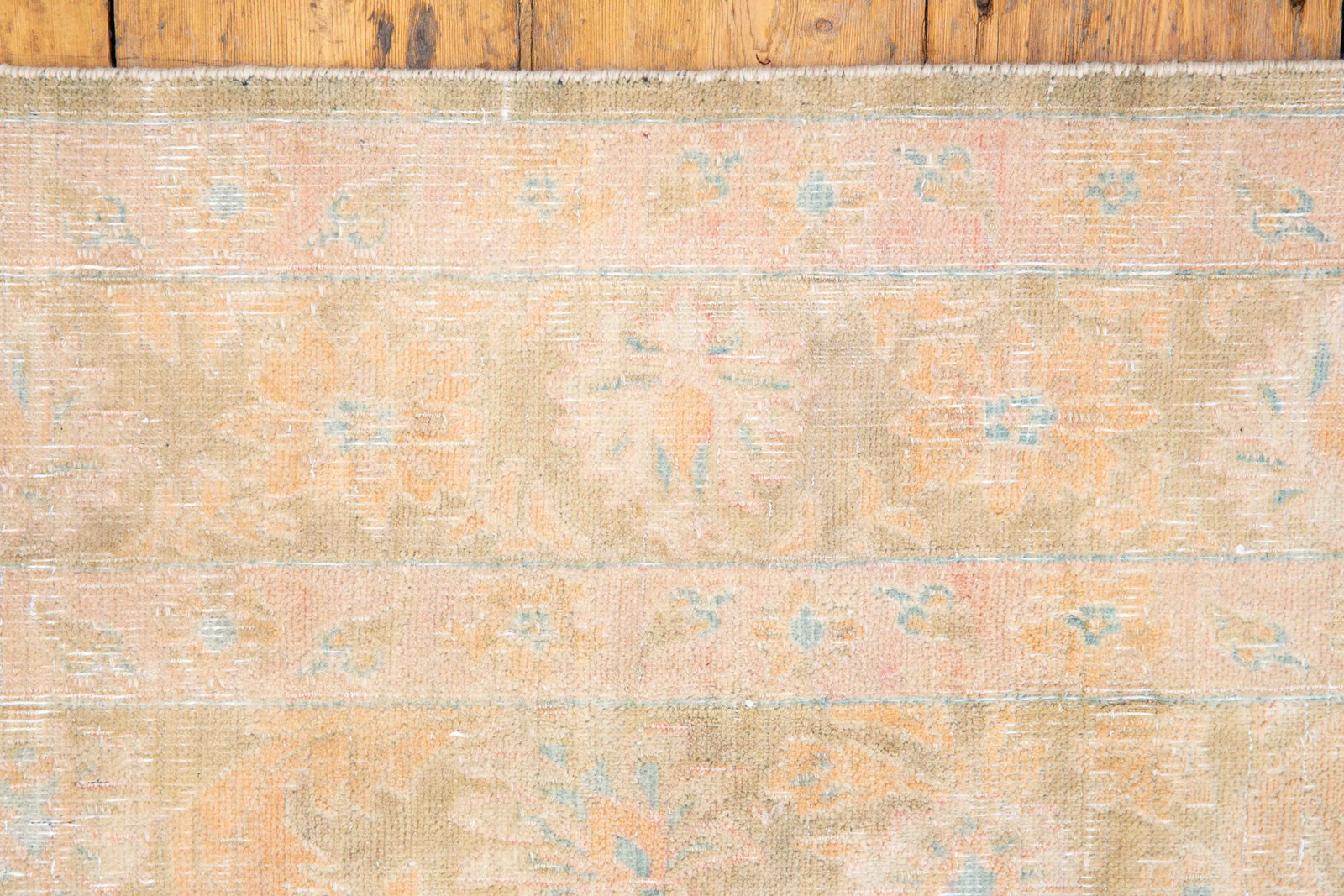 This is a vintage Persian Tabriz rug that has been over-dyed to gently fade its original colours, giving a more neutral palette. Persia has the most desirable rugs and carpets with stunning designs such as this carpet. Now available at Ourika London.