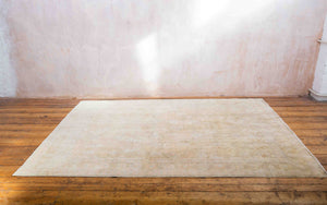 This is a vintage Persian Mahal rug that has been over-dyed to gently fade its original colours, giving a more neutral palette. Persia has the most desirable rugs and carpets with stunning designs such as this carpet. Now available at Ourika London.