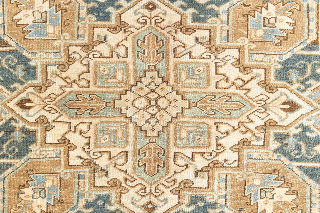 This is a vintage Persian Heriz rug that has been over-dyed to gently fade its original colours, giving a more neutral palette. Persia has the most desirable rugs and carpets with stunning designs such as this carpet. Now available at Ourika London.