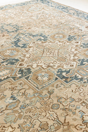 This is a vintage Persian Heriz rug that has been over-dyed to gently fade its original colours, giving a more neutral palette. Persia has the most desirable rugs and carpets with stunning designs such as this carpet. Now available at Ourika London.