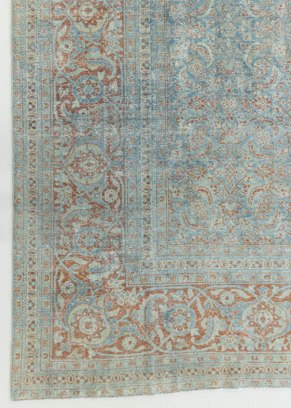 This is a handmade antique Farahan rug, woven in Persia. The Farahan region is known for producing some of the most ornate Persian carpets, often known for their mesmerising and intricate repeating patterns.