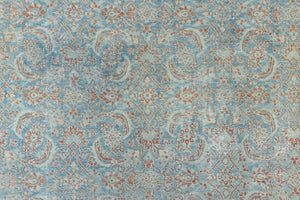 This is a handmade antique Farahan rug, woven in Persia. The Farahan region is known for producing some of the most ornate Persian carpets, often known for their mesmerising and intricate repeating patterns.