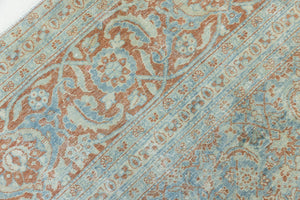 This is a handmade antique Farahan rug, woven in Persia. The Farahan region is known for producing some of the most ornate Persian carpets, often known for their mesmerising and intricate repeating patterns.