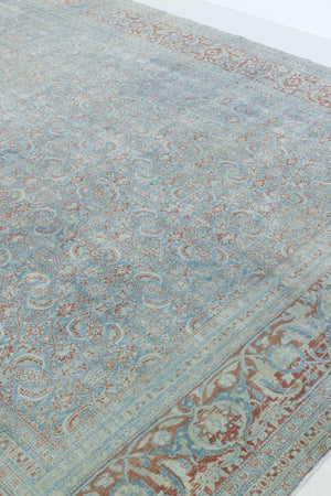 This is a handmade antique Farahan rug, woven in Persia. The Farahan region is known for producing some of the most ornate Persian carpets, often known for their mesmerising and intricate repeating patterns.