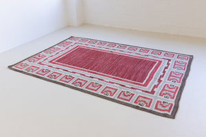 A rare vintage Swedish flatweave rug with a geometric Greek revival pattern in red, gray, and beige colours, featuring a wide border. By designer Aina Kånge