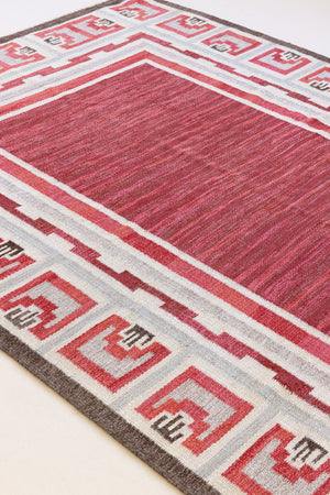 A rare vintage Swedish flatweave rug with a geometric Greek revival pattern in red, gray, and beige colours, featuring a wide border. By designer Aina Kånge