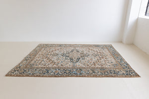 Claudia is a vintage Persian Heriz rug that has been over-dyed to gently fade its original colours, giving a more neutral palette. Persia has the most desirable rugs and carpets with stunning designs such as this carpet. Now available at Ourika London.
