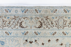 This pair of vintage handknotted Persian rugs are from the Tabriz region. Perisa is one of the oldest rug weaving centres in the world featuring floral patterns and muted colours as seen on these carpets.