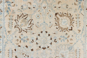 This pair of vintage handknotted Persian rugs are from the Tabriz region. Perisa is one of the oldest rug weaving centres in the world featuring floral patterns and muted colours as seen on these carpets.