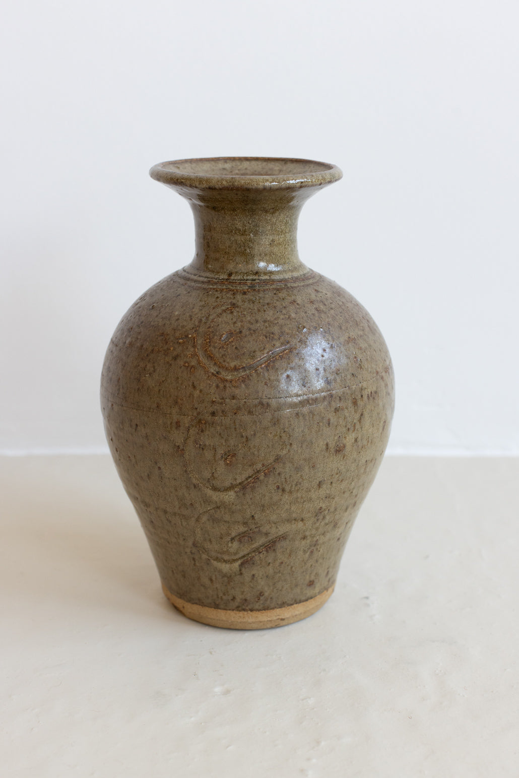 A GLAZED STUDIO POTTERY VASE