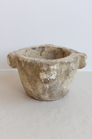 AN EXTRA LARGE ANTIQUE STONE MORTAR