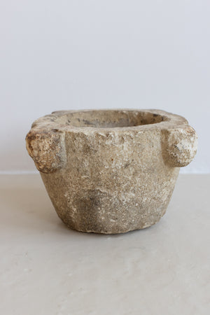 AN EXTRA LARGE ANTIQUE STONE MORTAR