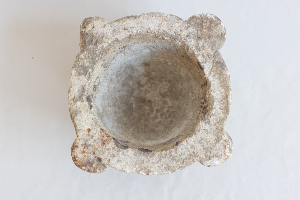 AN EXTRA LARGE ANTIQUE STONE MORTAR