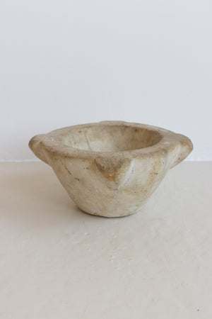 AN EXTRA LARGE MARBLE MORTAR