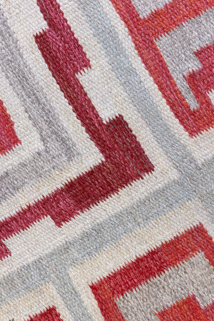 A rare vintage Swedish flatweave rug with a geometric Greek revival pattern in red, gray, and beige colours, featuring a wide border. By designer Aina Kånge