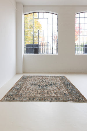 Claudia is a vintage Persian Heriz rug that has been over-dyed to gently fade its original colours, giving a more neutral palette. Persia has the most desirable rugs and carpets with stunning designs such as this carpet. Now available at Ourika London.