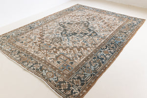 Claudia is a vintage Persian Heriz rug that has been over-dyed to gently fade its original colours, giving a more neutral palette. Persia has the most desirable rugs and carpets with stunning designs such as this carpet. Now available at Ourika London.