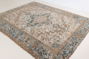 Claudia is a vintage Persian Heriz rug that has been over-dyed to gently fade its original colours, giving a more neutral palette. Persia has the most desirable rugs and carpets with stunning designs such as this carpet. Now available at Ourika London.