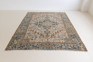 Claudia is a vintage Persian Heriz rug that has been over-dyed to gently fade its original colours, giving a more neutral palette. Persia has the most desirable rugs and carpets with stunning designs such as this carpet. Now available at Ourika London.