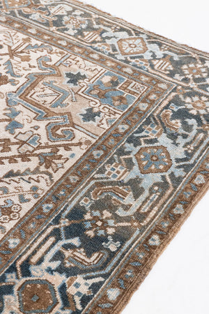 Claudia is a vintage Persian Heriz rug that has been over-dyed to gently fade its original colours, giving a more neutral palette. Persia has the most desirable rugs and carpets with stunning designs such as this carpet. Now available at Ourika London.